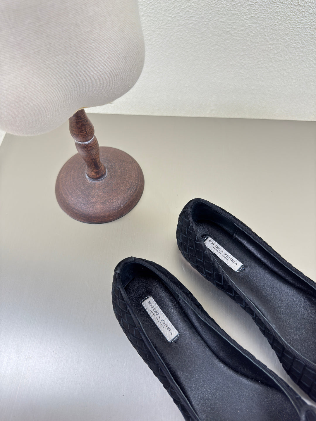BOTTEGA VENETA BALLET FLAT IN BLACK INTRECCIATO SUEDE WITH BOW