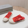 SNEAKER MULES IN RED CANVAS GRAFFITI LOGO