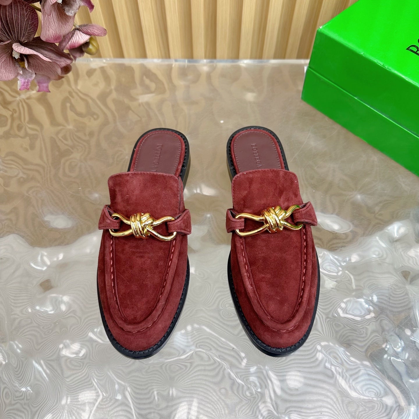 BOTTEGA VENETA OPEN-BACK LOAFER REALISED IN GARNET RED SUEDE WITH SIGNATURE METALLIC KNOT DETAIL