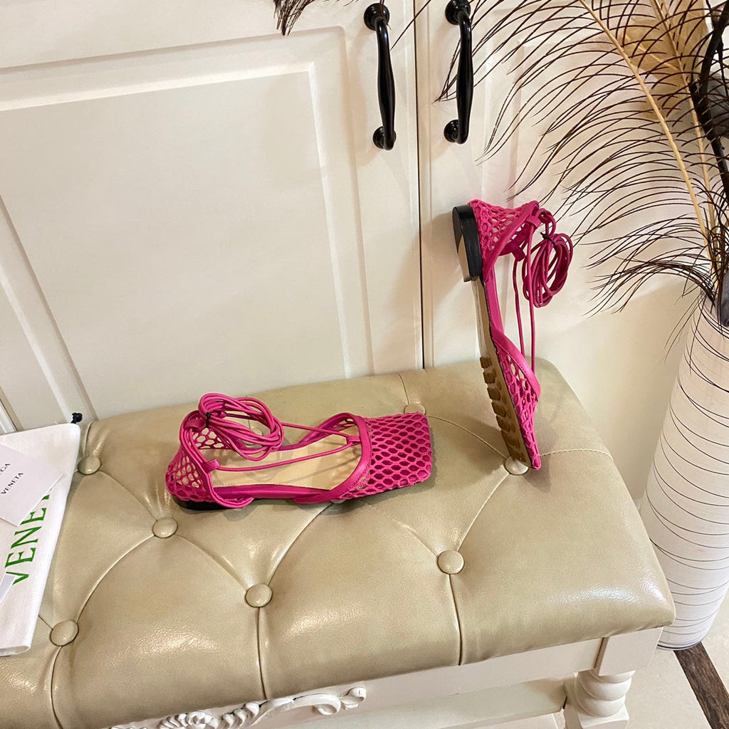 BOTTEGA VENETA STRETCH LACE-UP FLAT SANDAL IN BRIGHT PINK METALLIZED MESH AND LEATHER