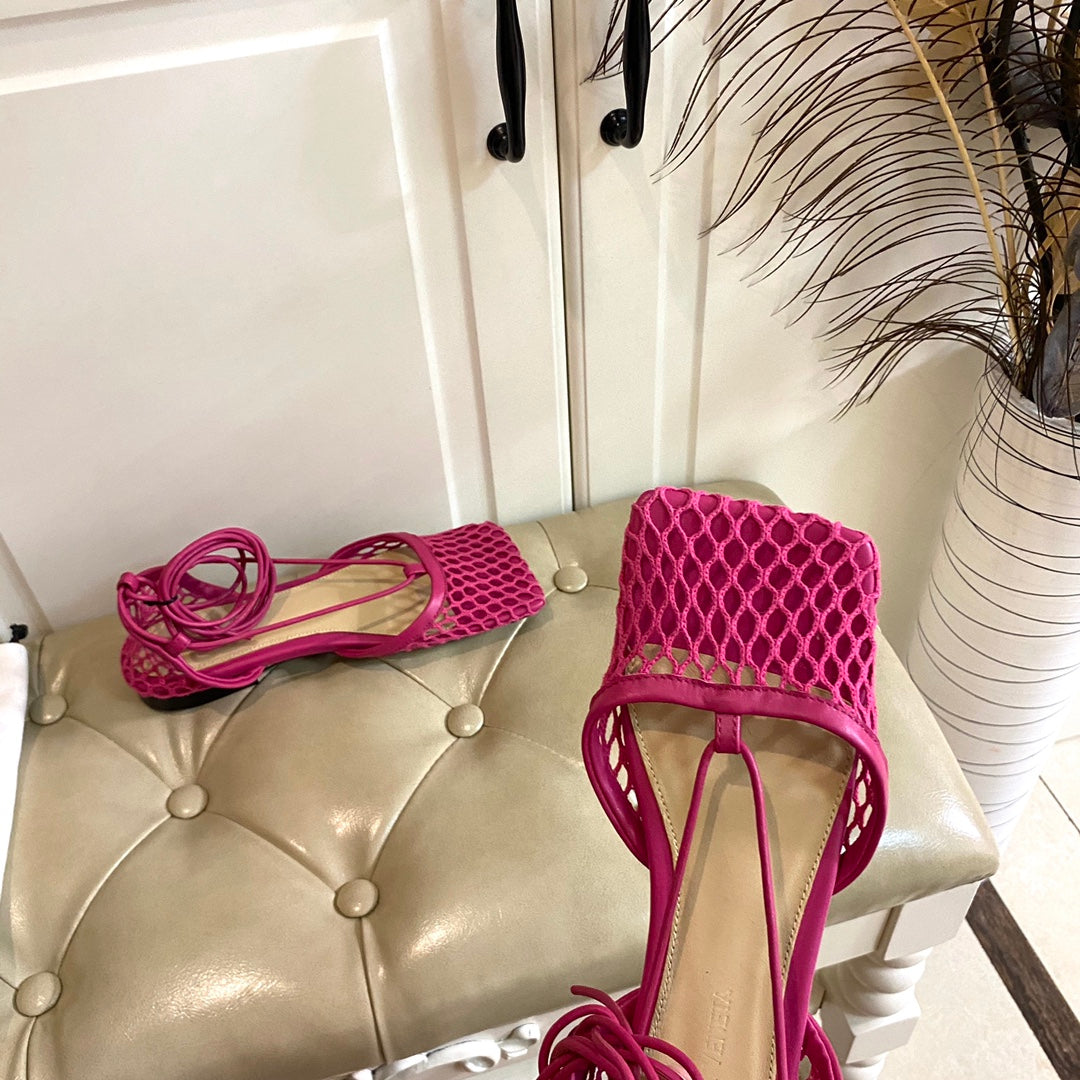 BOTTEGA VENETA STRETCH LACE-UP FLAT SANDAL IN BRIGHT PINK METALLIZED MESH AND LEATHER