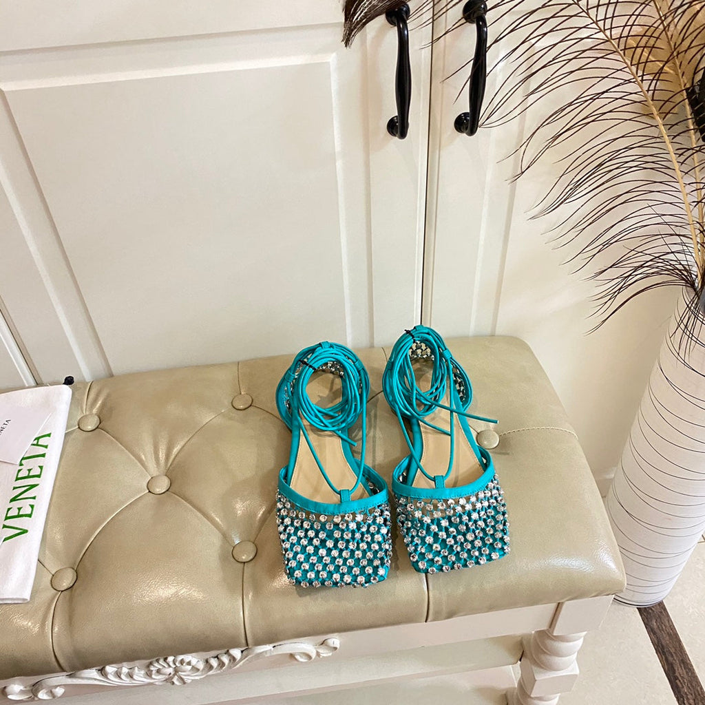 BOTTEGA VENETA LACE-UP FLAT SANDAL IN CERULEAN BLUE METALLIZED MESH AND LEATHER WITH RHINSTONES