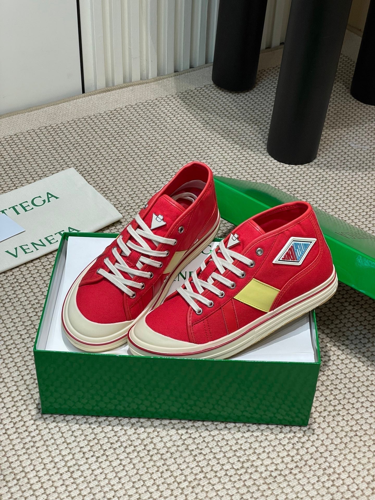 BOTTEGA VENETA ELIOT SNEAKER IN CHERRY RED CANVAS AND CALFSKIN