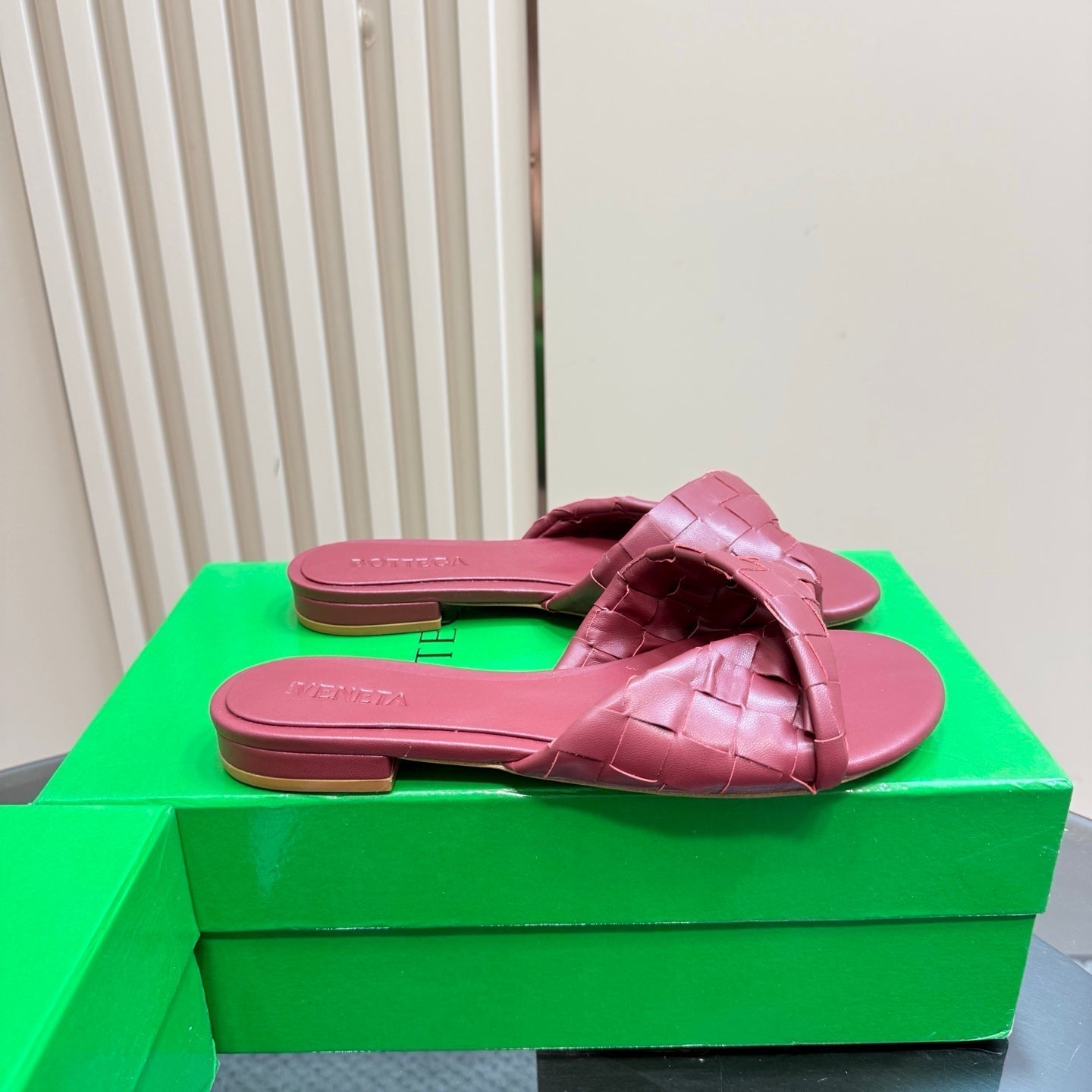 BOTTEGA VENETA BLINK FLAT MULE IN BERRY RED INTRECCIATO LEATHER