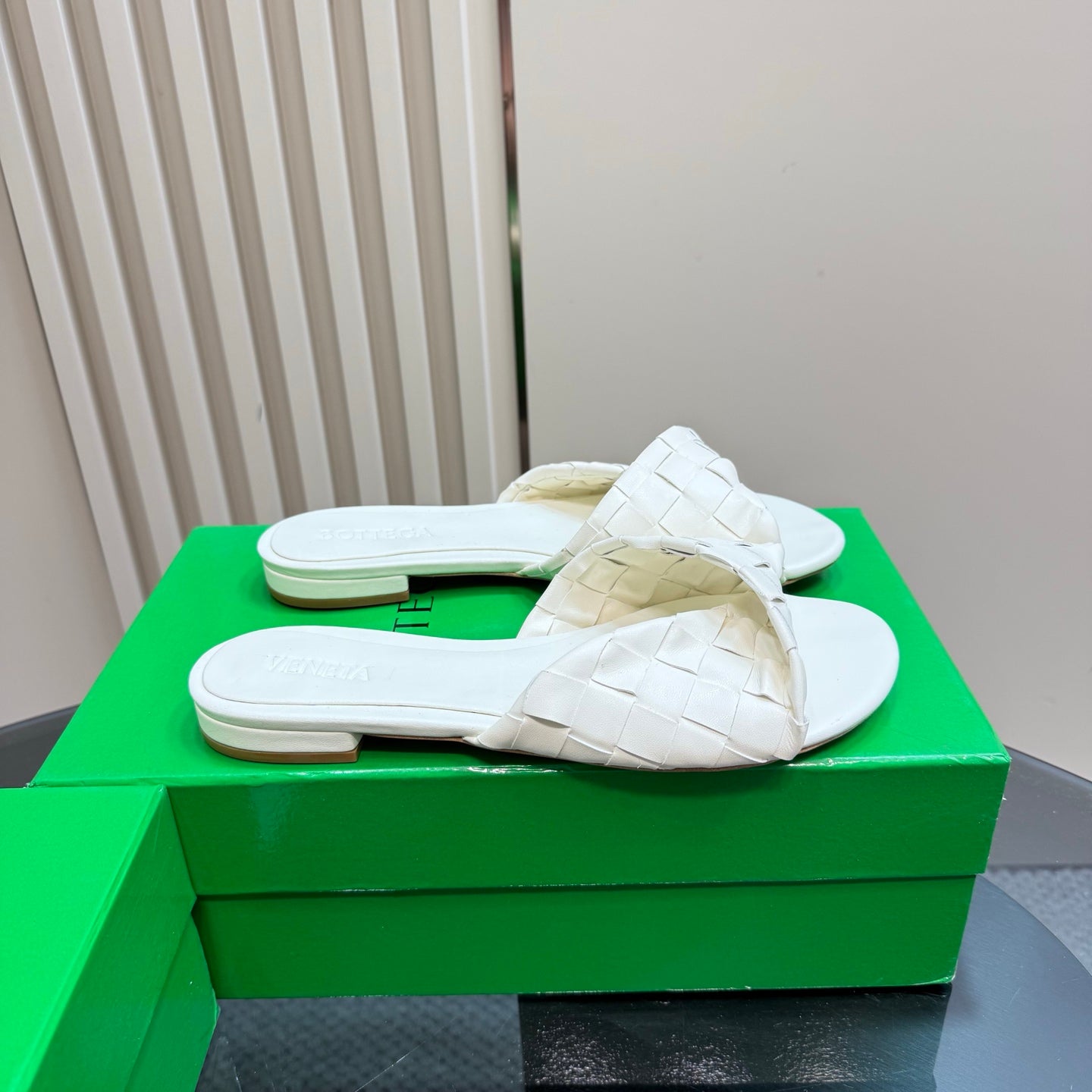 BOTTEGA VENETA BLINK FLAT MULE IN WHITE INTRECCIATO LEATHER